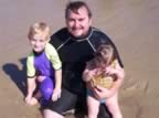 Ehtan David and Jocelyn Surfing (48kb)